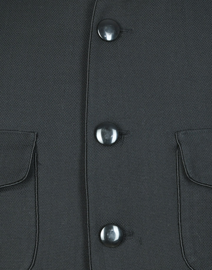 Classic Button Closure and Flat Pocket Image